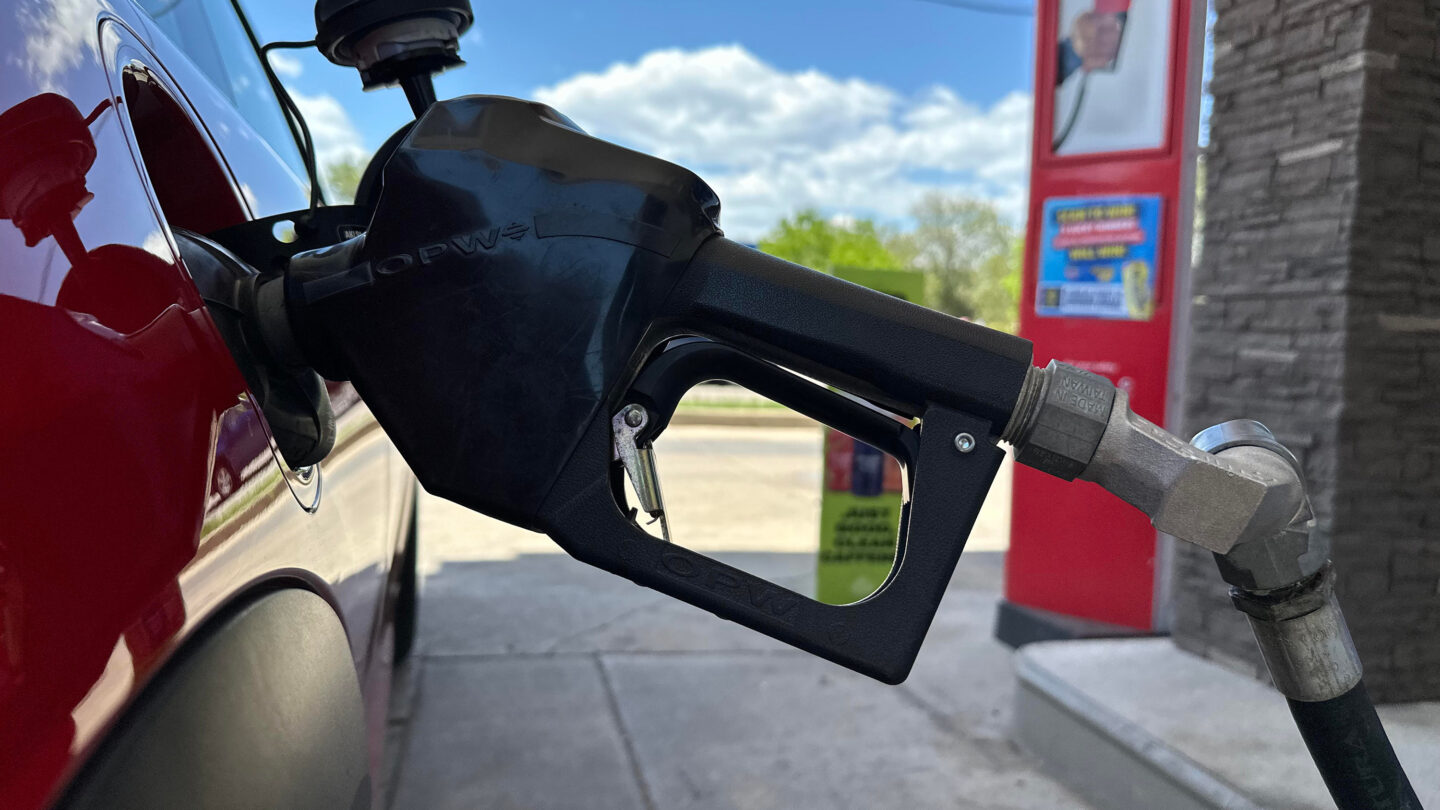 A pump fills up the tank of a vehicle at an Exxon gasoline station