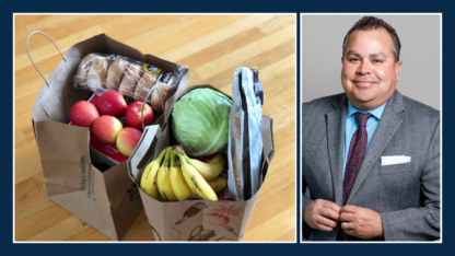 On the left are two paper bags full of groceries. On the right is a portrait of a man wearing a grey suit.