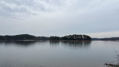 A large lake with the outline of an island in the distance