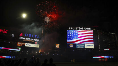 A fireworks display at Truist Park at night